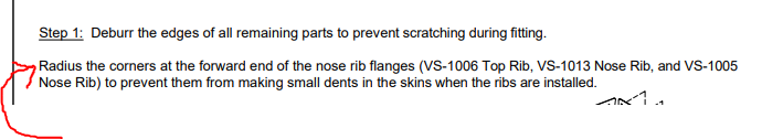 A step from the instructions saying to Radius the corners at the forward end of the nose rib flanges to prevent them from making small dents in the skins when the ribs are installed. There is no picture associated