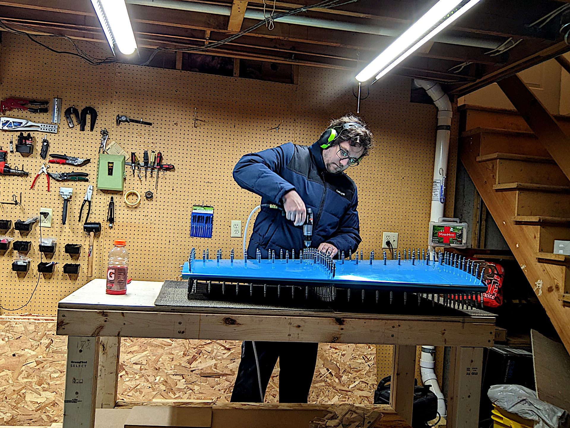 Picture of me drilling out holes on the vertical stabilizer