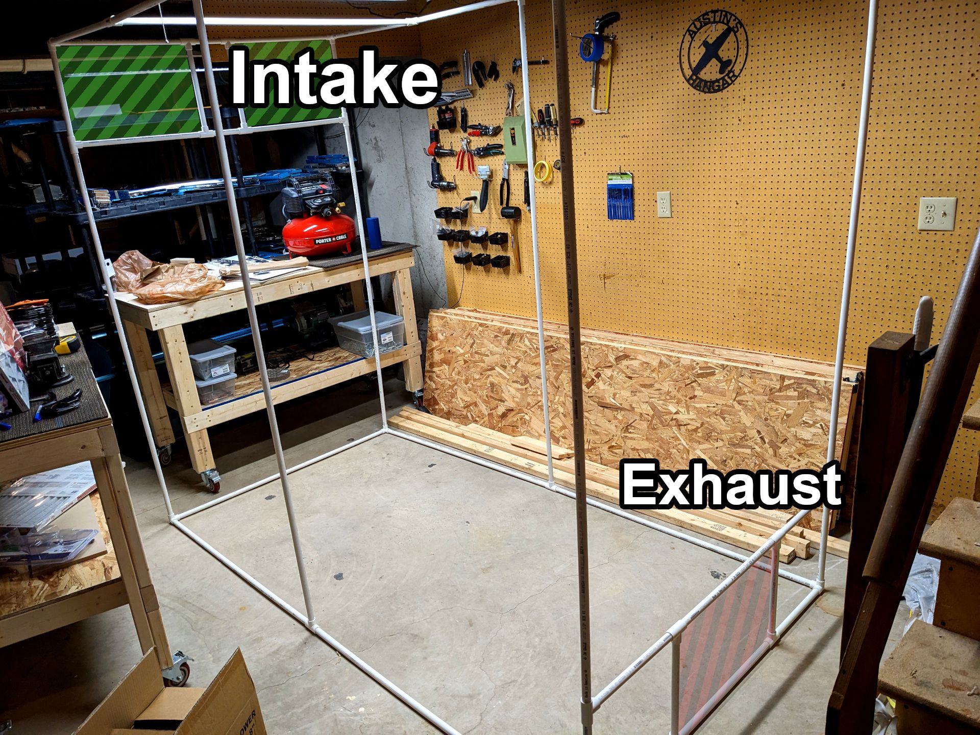 PVC frame with labelled areas for intake and exhaust filters