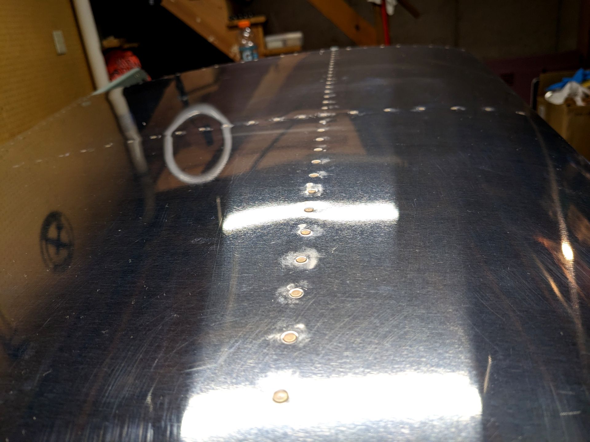 Close up of the surface of the above vertical stabilizer. The rivets are all flush with the surface